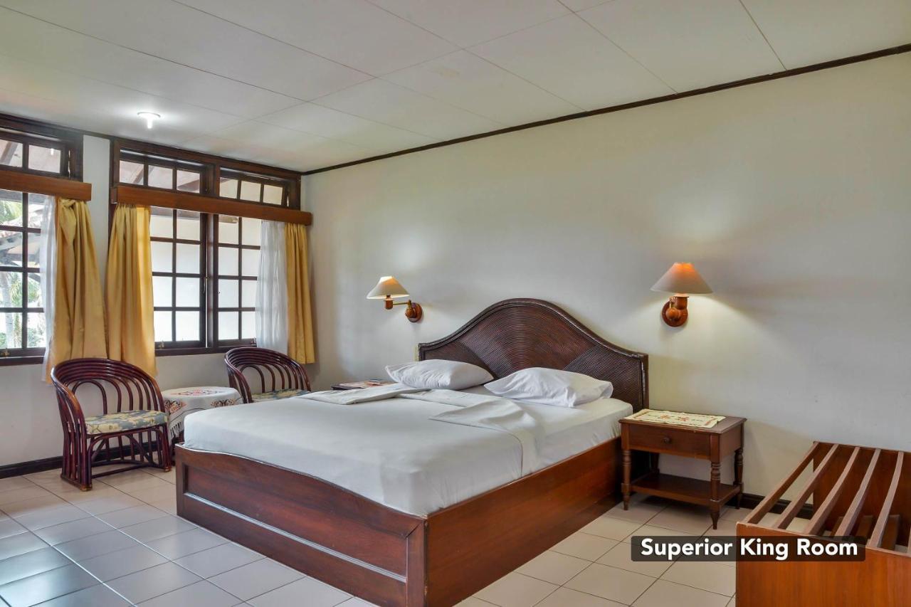 Silintong Hotel Ambarita Exterior foto